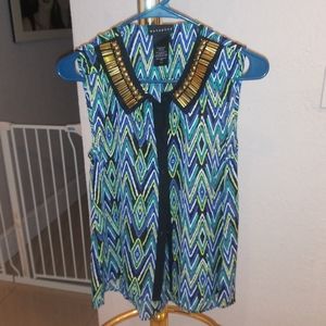 Elegant Sleeveless Loose Fitting Blouse